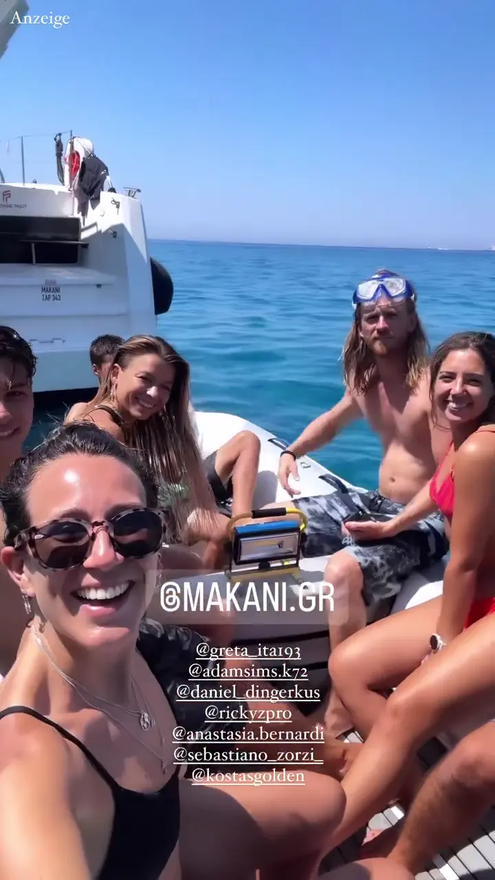 Makani guests enjoying time on deck during a Cyclades sailing trip.